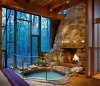 an indoor fireplace and hot tub.jpg