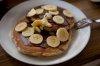 Twe pancakes with nuttela and banana.jpg