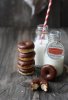 Mini donuts witg chocolate glaze and bottles of milk.jpg