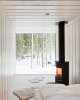 White bedroom, fireplace, snow outside.jpg