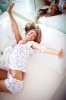 3389837-665396-young-woman-waking-up-happy-with-a-morning-stretch.jpg