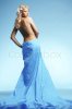 2723445-647313-portrait-of-very-beautiful-woman-wearing-long-dress-over-blue.jpg