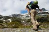 7269963-Young-girl-with-backpack-in-the-mountains-Stock-Photo-backpack-mountain-hiking.jpg