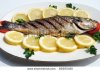 stock-photo-grill-cooked-fish-with-lemon-slices-and-parsley-82695490.jpg