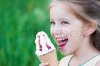 4193278-914198-beautiful-little-girl-eats-ice-cream.jpg