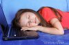 girl-sleeping-at-the-pc-thumb14646338.jpg